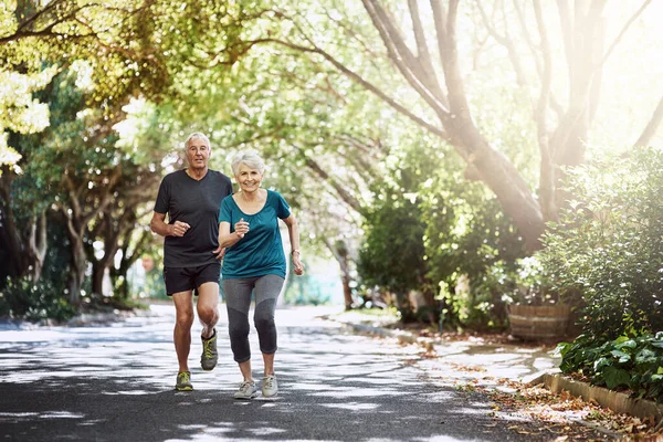 stock image The best feeling is getting our hearts racing. a senior couple out for a run together