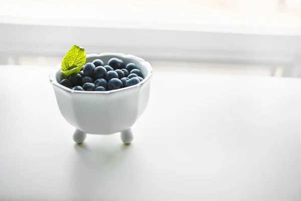 Tiny Fruit Enormous Health Benefits Fresh Blueberries Bowl White Table — Stock Photo, Image
