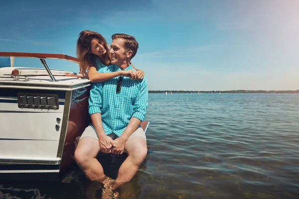 You float my boat, babe. a young couple spending time together on a yacht