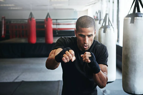 stock image Today is another opportunity to tap into your greatness. a kick-boxer training in a gym