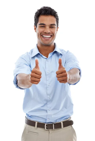 stock image An enthusiastic approval. Studio shot of a young man giving the thumbs up sign isolated on white