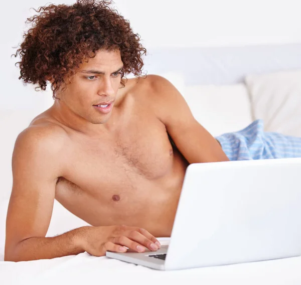 Never Too Early Get Connected Young Man Propped Bed Using — Stock Photo, Image
