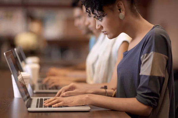 Study Group Dynamics Studious Young Woman Working Her Laptop Blurred — Stock Photo, Image