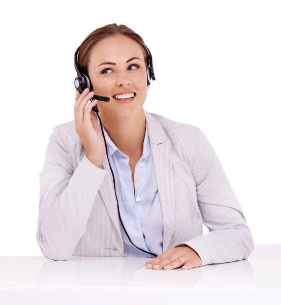 stock image Let me me see what I can do to help...Professional call center agent working while wearing a headset - isolated on white