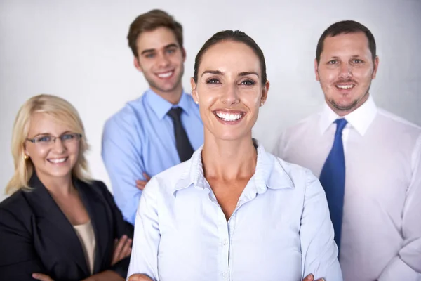 Always Back Group Four Businesspeople Smiling Confidently Camera — Stock Photo, Image