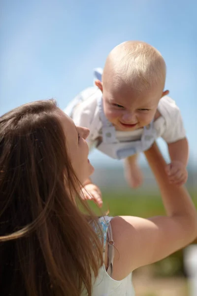 Hes Her Little Superman Cute Toddler Being Held His Mother — Stock Photo, Image