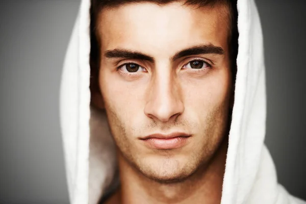 stock image Serious about my personal style. Portrait of a good looking male with a hoodie on