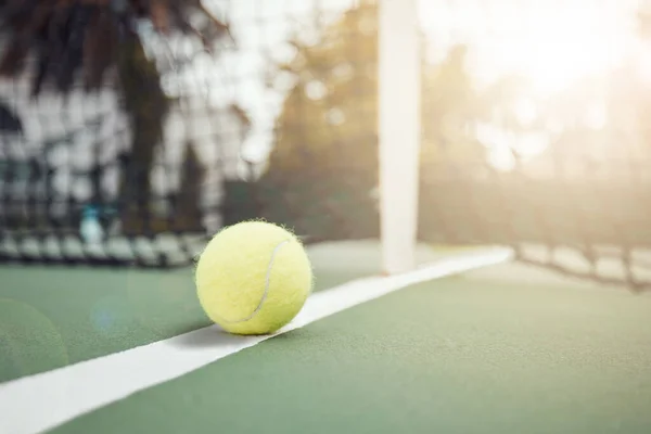 Closeup One Yellow Tennis Ball Floor Hitting Net Game Court — Stok fotoğraf