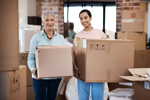 A new address might be just what we need. a senior woman moving house with help from her daughter