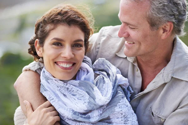 stock image My one and only. a mature couple laughing and embracing while enjoying a day out in nature