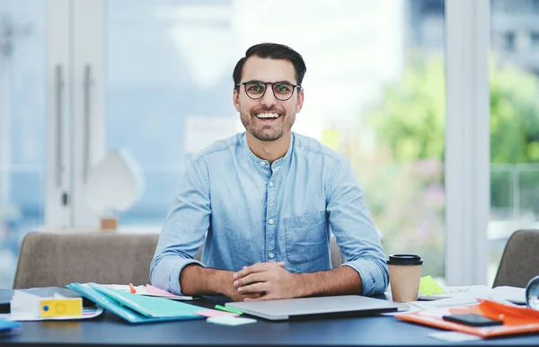 stock image I hope to be leaving a mark with my designs. Portrait of a young designer working in an office