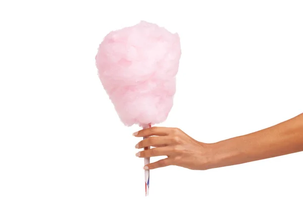 stock image Closeup, woman and hand with cotton candy, dessert and sweets isolated against a white studio background. Zoom, female person and model with a carnival snack, tasty and fingers with sugar clouds.