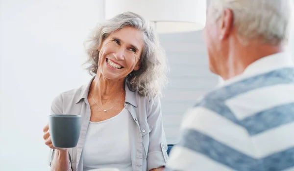 stock image Life is as relaxing as you plan for it. a senior couple enjoying a relaxing coffee break on the sofa at home