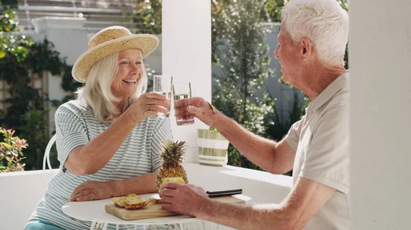 Cheers Love Happy Senior Couple Sitting Together Toasting Water While — Stock Photo, Image
