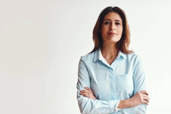 Stock image Im here to dominate the business world. Portrait of a confident businesswoman in a modern office