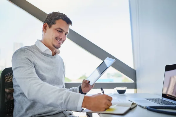 Hes Getting Lot Done Today Young Businessman Writing Notes While — Stock Photo, Image