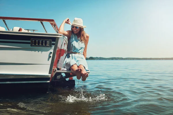 stock image Having yachts of fun. an attractive young woman spending the day on her private yacht