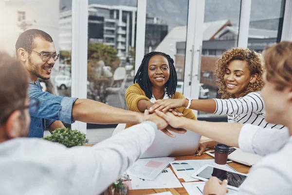 stock image Were in this together. a group of businesspeople joining their hands together in unity