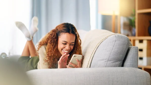 Young Woman Smiling Laughing While Texting Phone Home Cheerful Female — Foto Stock
