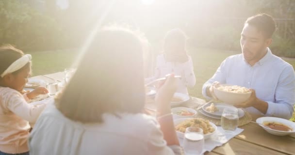 Multi Generation Asian Family Eating Lunch Garden Home Bonding Happy — 图库视频影像