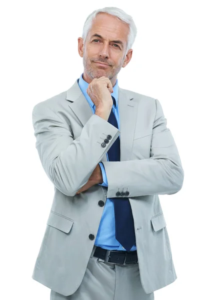 stock image Planning out his next business venture. Studio shot of a thoughtful-looking mature businessman isolated on white