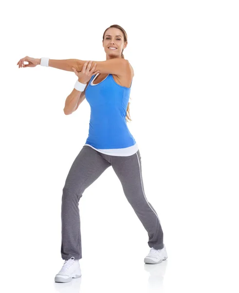 Haar Spieren Opwarmen Gezonde Jonge Vrouw Sportkleding Stretching Terwijl Geïsoleerd — Stockfoto