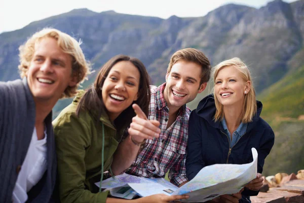 Lets Hike Top Mountain Shot Young Group Friends Studying Map — Stock Photo, Image