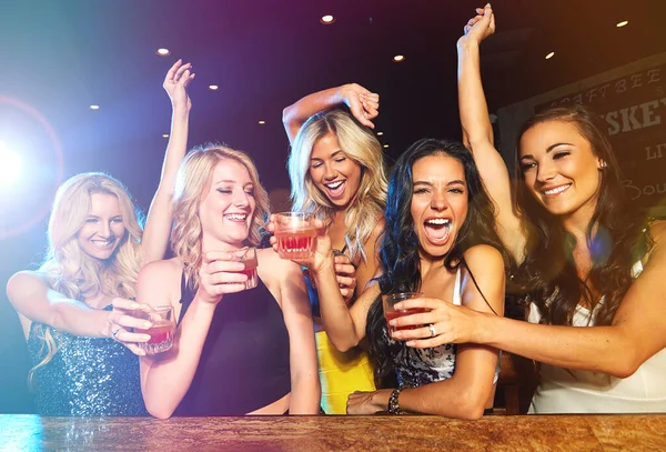 stock image Partying hard. young women drinking cocktails in a nightclub