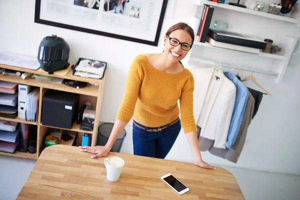 stock image I love my job. Portrait of a young female designer at her desk