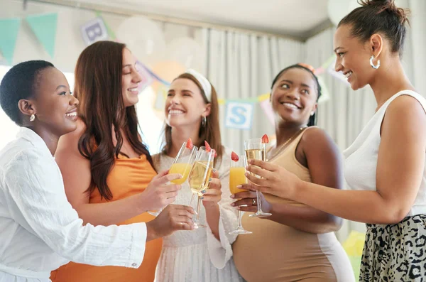 stock image Were glad to be with you today. a group of female friends toasting to their pregnant friend at a baby shower