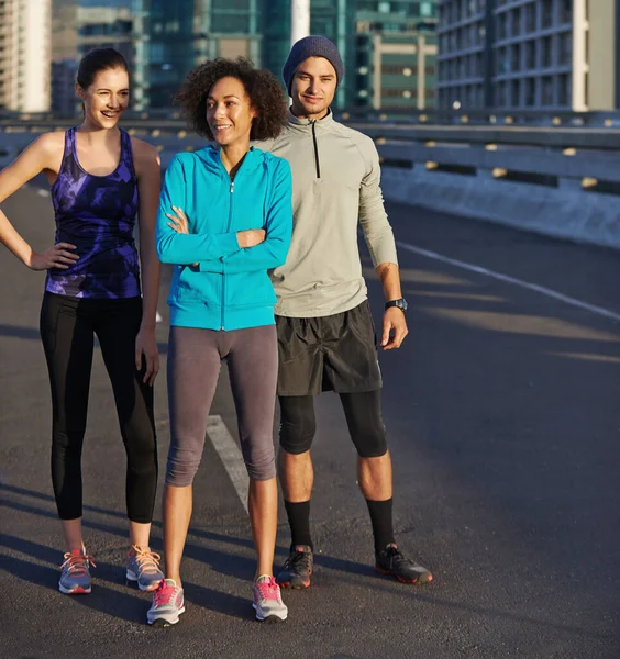 Fantasitc Three Jogging Three Young Joggers Standing Empty Road City — Stock Photo, Image