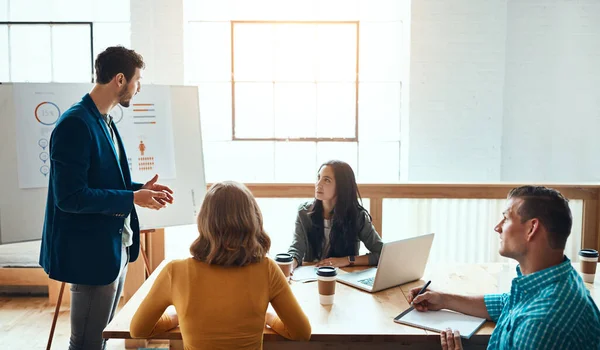 The creative talent responsible for startup growth. a group of young businesspeople having a meeting in a modern office