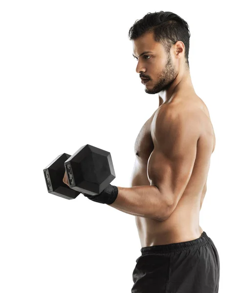Doskonalenie Tych Bestialskich Bicepsów Studio Ujęcie Młodego Mężczyzny Podnoszącego Hantle — Zdjęcie stockowe