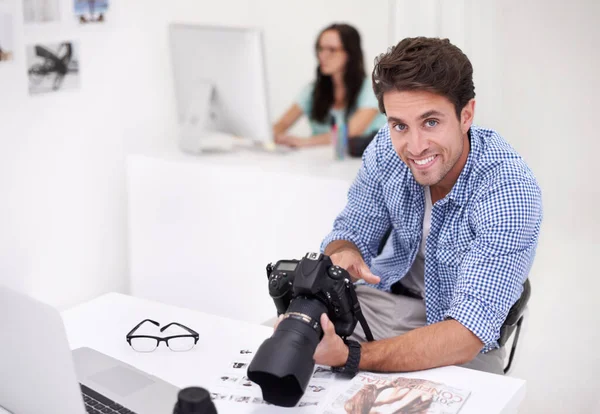 Using Tools Trade Two Photographers Sitting Office Working Layouts Inspecting — Stock Photo, Image