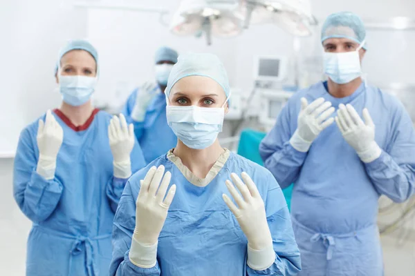Hands Make Great Surgeons Portrait Four Surgeons Holding Hands Wearing — Stock Photo, Image