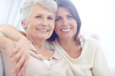 We live for these moments. Portrait of an affectionate mother and daughter spending time together at home clipart