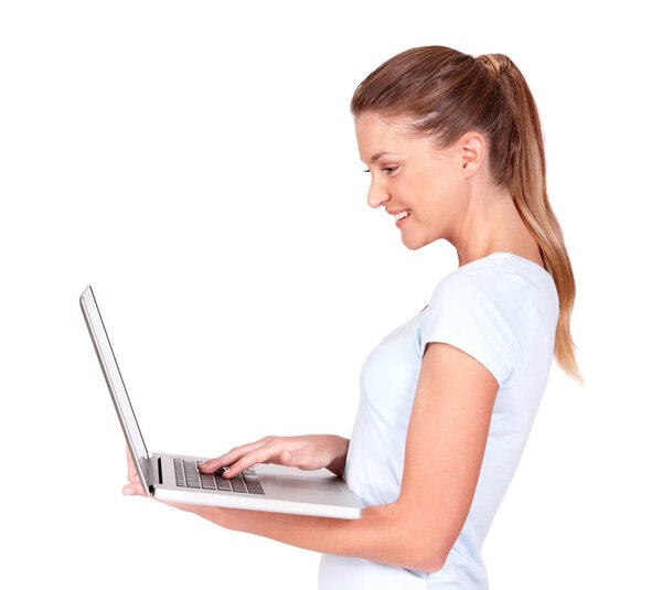 Happy woman, laptop and online research standing isolated against a white studio background. Excited female with smile working on computer or technology for browsing, email or networking on mockup.