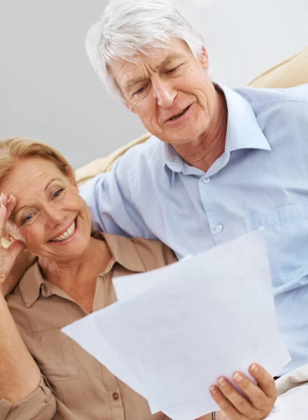 Retirement Package Finally Came Senior Couple Looking Pleased While Reading — Stock Photo, Image
