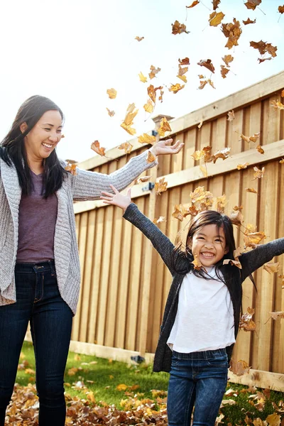 stock image Nothing inspires happiness like fall. an adorable little girl enjoying an autumn day outdoors