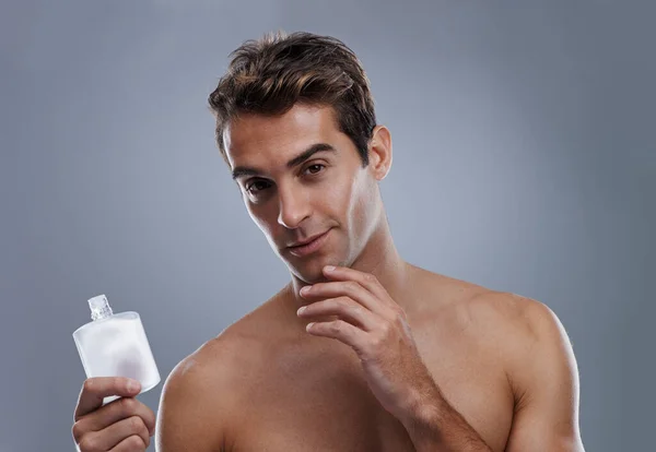 Always Looks Smells Great Studio Portrait Man Holding Bottle Aftershave — Stock Photo, Image