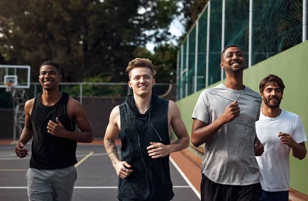 Doing Laps Court Group Sporty Young Men Running Sports Court — Stock Photo, Image