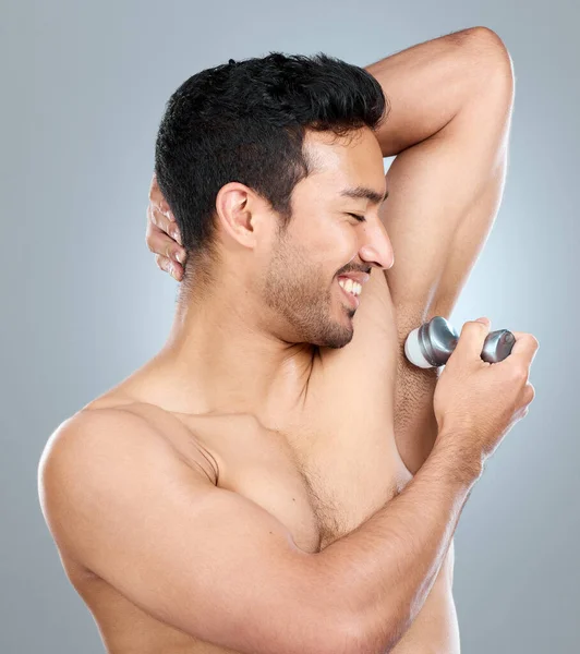Helps Stay Fresher Longer Man Applying Perspirant While Standing Grey — Stock Photo, Image