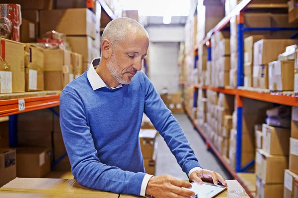 Hes Got Your Shipment Covered Mature Man Working Printing Distribution — Stock Photo, Image