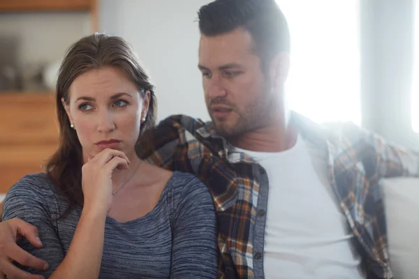 stock image Relationships are about appreciating the similarities and accepting the differences. a young married couple having a disagreement in the living room at home