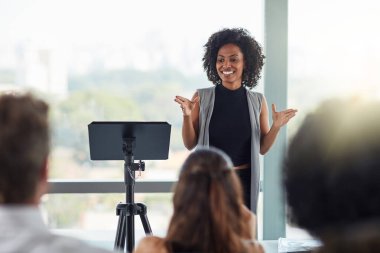 Corporate, businesswoman with presentation and in business meeting in conference room at work. Presenter, happy female speaker and black woman at seminar or workshop speaking with businesspeople. clipart