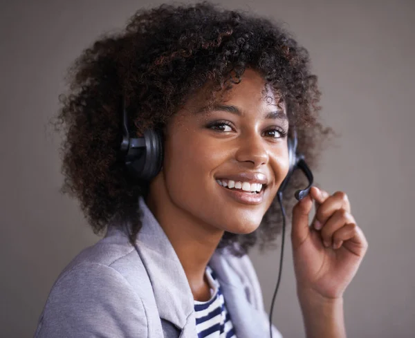 stock image Portrait, call center and consultant woman in headset for virtual communication, technical support or talking online. Professional agent or face of happy, African business person in telemarketing job.