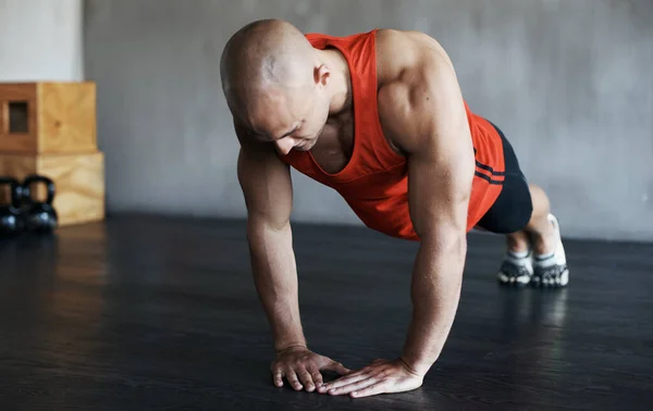 stock image Strong, muscle and man doing strength push up for fitness lifestyle, determination or body fitness commitment. Diamond pushup, power challenge or active person workout, bodybuilding or floor exercise.