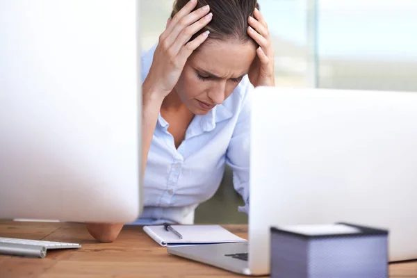 Headache, stress and problem of woman in office, laptop and brain fog for anxiety, depression and glitch. Burnout, mental health and sad female employee worried at computer for mistake, fail and risk.