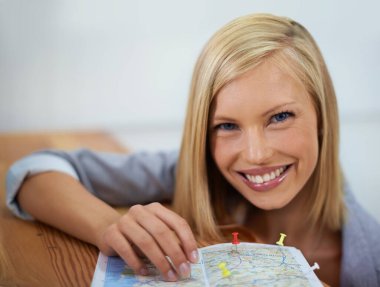 Travel agent, map pin and portrait of happy woman planning sightseeing destination, holiday location or world tour adventure. Tourism agency, service and face of person smile for transport route plan. clipart