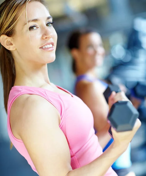 Making Great Progress Beautiful Young Woman Working Out Gym Royalty Free Stock Images